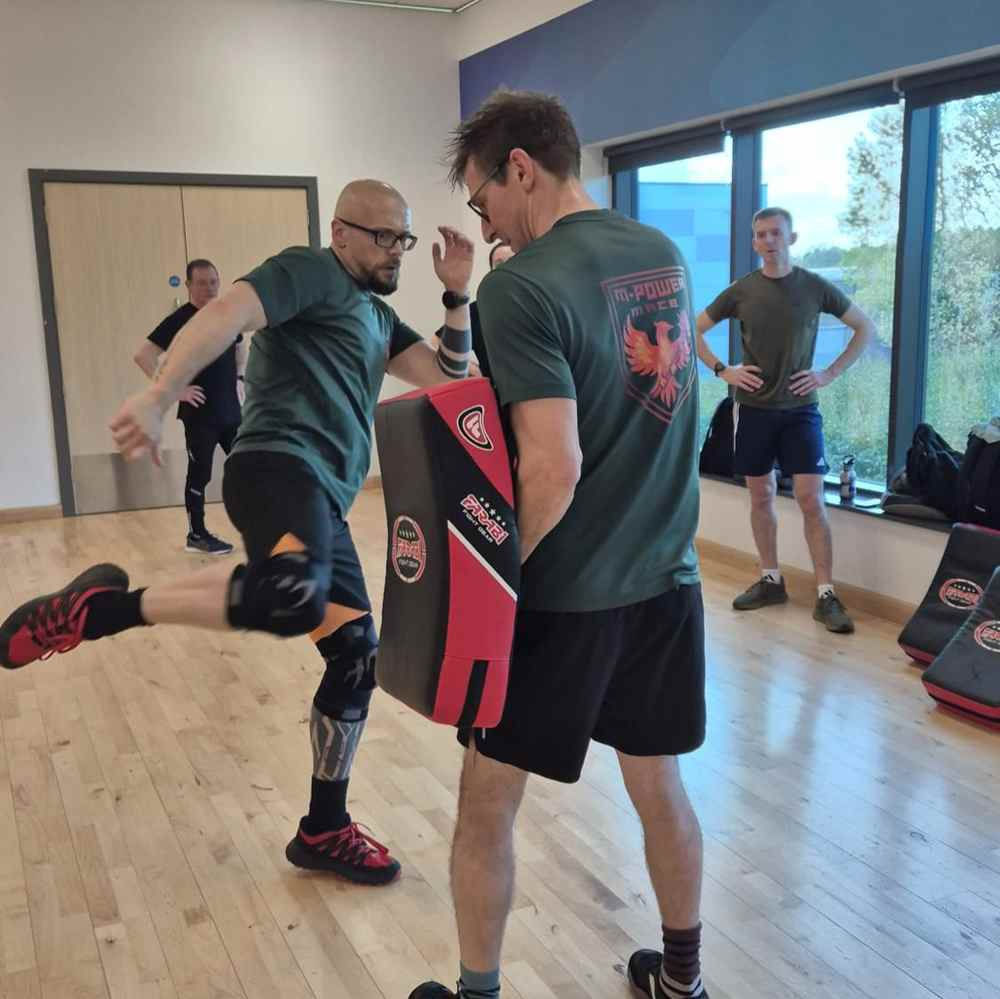 Combat techniques practised during an M-Power endurance and agility class